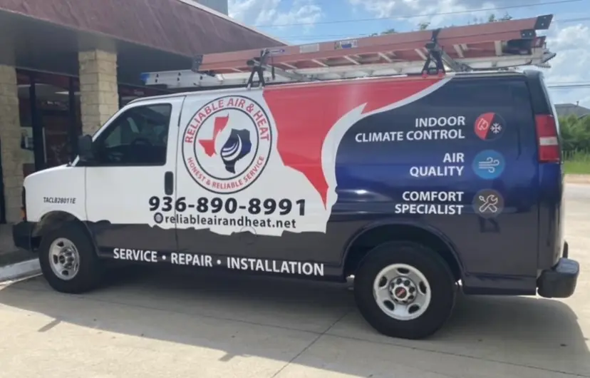 Reliable Air & Heat cargo van with SERVICE, REPAIR, INSTALLATION and the licence number on the door